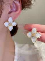 IVORY FLARE- GENTLE OFF-WHITE BLOOM STUDS