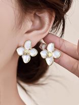 IVORY FLARE- GENTLE OFF-WHITE BLOOM STUDS