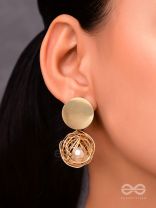 Mirror reflection- pearl in a cage of gold earrings