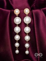 Elegance is a deadly weapon- white pearls statement earrings