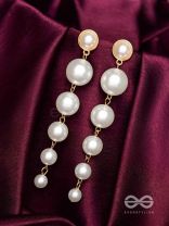 Elegance is a deadly weapon- white pearls statement earrings