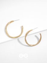 The Subtle Affirmation Golden Twists Hoop Earrings
