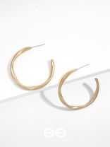The Subtle Affirmation Golden Twists Hoop Earrings