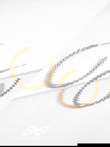 The Subtle Affirmation Golden Twists Hoop Earrings