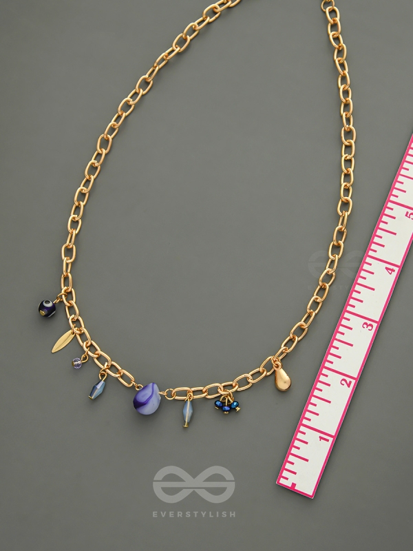 Fragments of the Sky- Blue Crystals Studded Golden Necklace