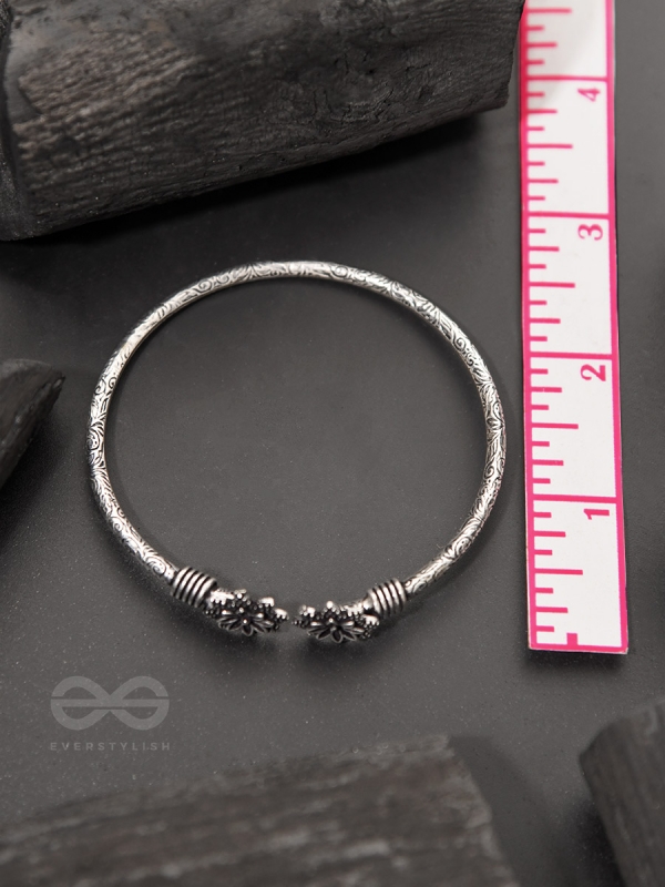Ups-a-Daisy- Oxidised Bangle Bracelet