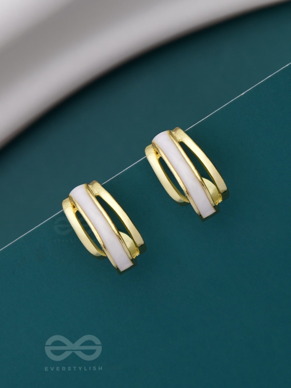 A CLASSY DAME - WHITE ENAMELLED GOLDEN STUDS