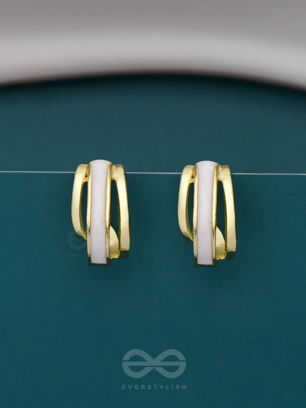 A CLASSY DAME - WHITE ENAMELLED GOLDEN STUDS