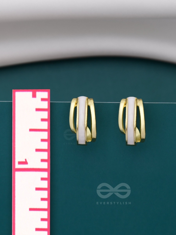 A CLASSY DAME - WHITE ENAMELLED GOLDEN STUDS