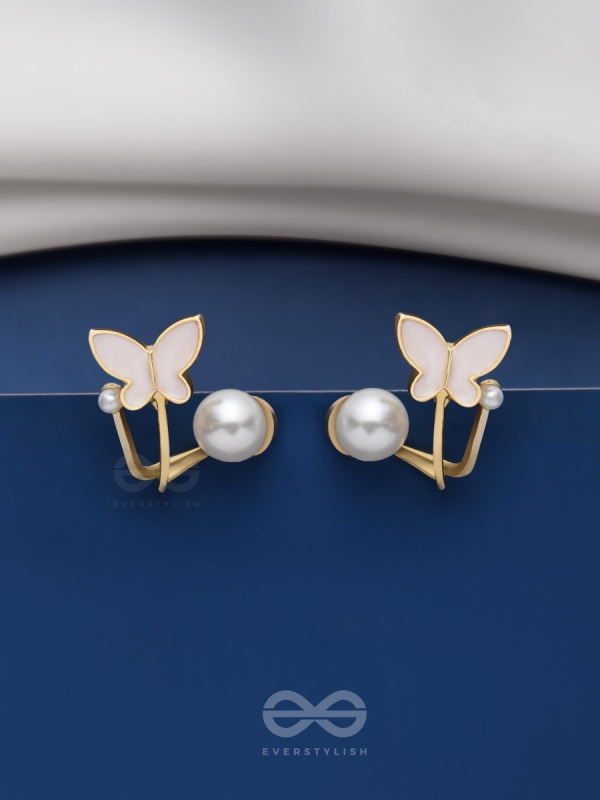 A WINGED WONDER - GOLDEN AND WHITE EAR JACKETS