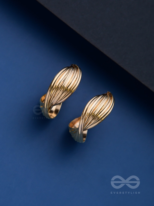 LEVELING IT UP - STATEMENT GOLDEN HOOPS