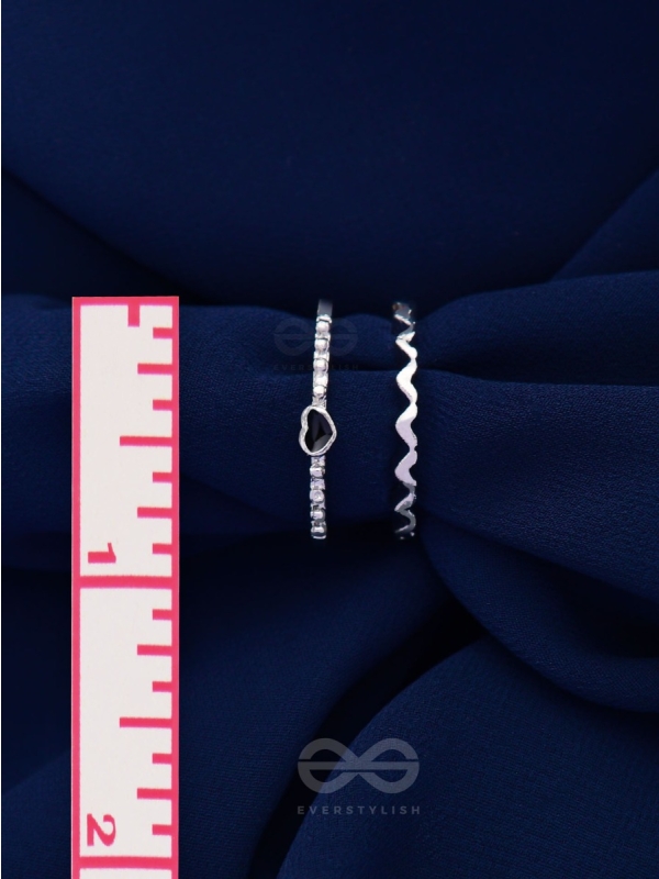 LIFE IN A ZIG-ZAG- SET OF 2 ADJUSTABLE SILVER RINGS