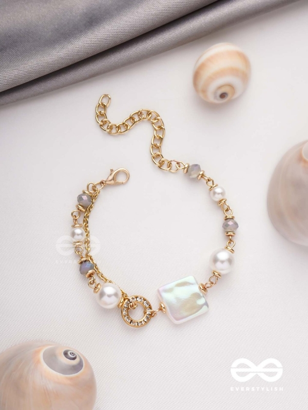CLASSIC IVORY ALLURE - GOLDEN EMBELLISHED BRACELET WITH ANTI TARNISH COATING 