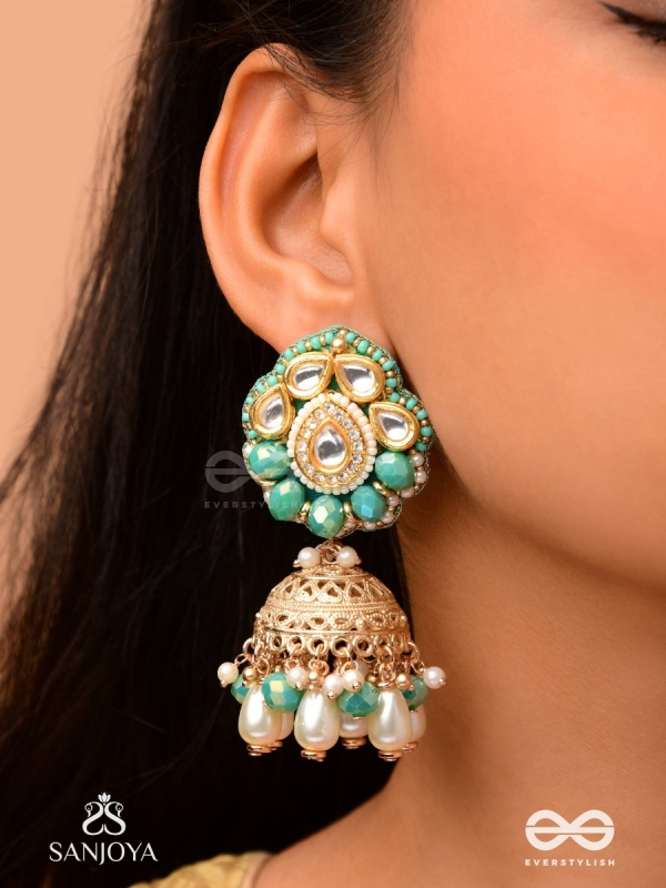 Sphārikā- Crystal Radiance-Jhumka earrings adorned with diamond shaped stones,beads and pearls of golden, white and turquoise accents
