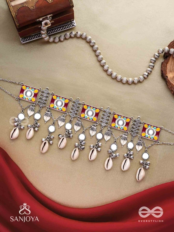  SANGRAHITAVARNA- COLLECTED HUES- ENAMELLED OXIDIZED CHOKER NECKPIECE IN PASTEL HUES WITH COWRIE SHELLS, GHUNGROOS AND MIRRORWORK