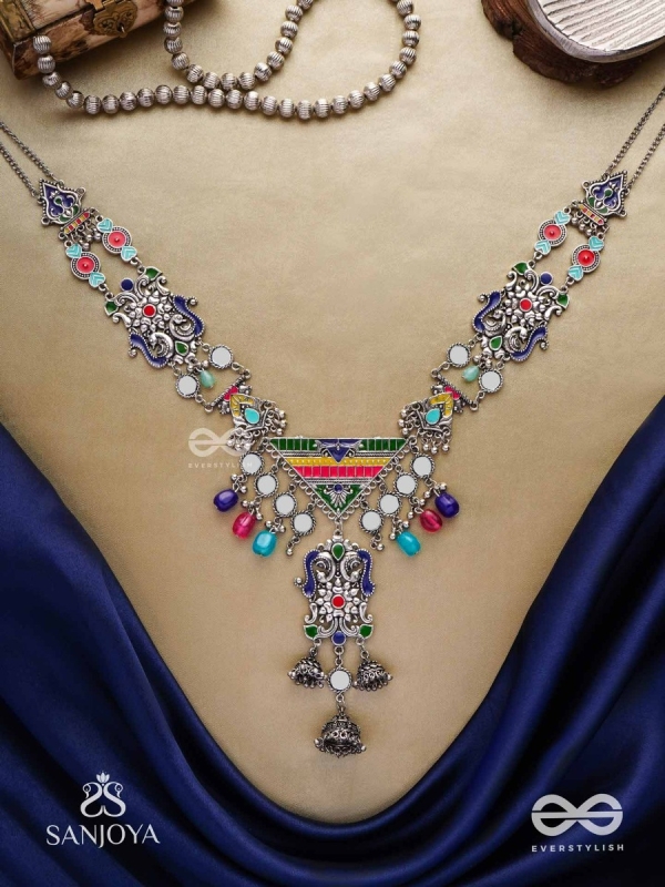 Prema raga- Love colour- Enamelled oxidized neckpiece embellished with beads, mirror and dangling jhumka.