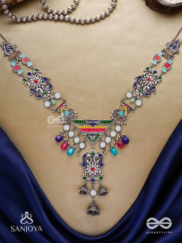 Prema raga- Love colour- Enamelled oxidized neckpiece embellished with beads, mirror and dangling jhumka.