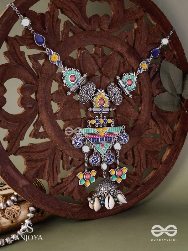Rangapadma-Color bloom- Enamelled Neckpiece with cowrie shells,mirror and colorful gemstones on oxidized metalwork.