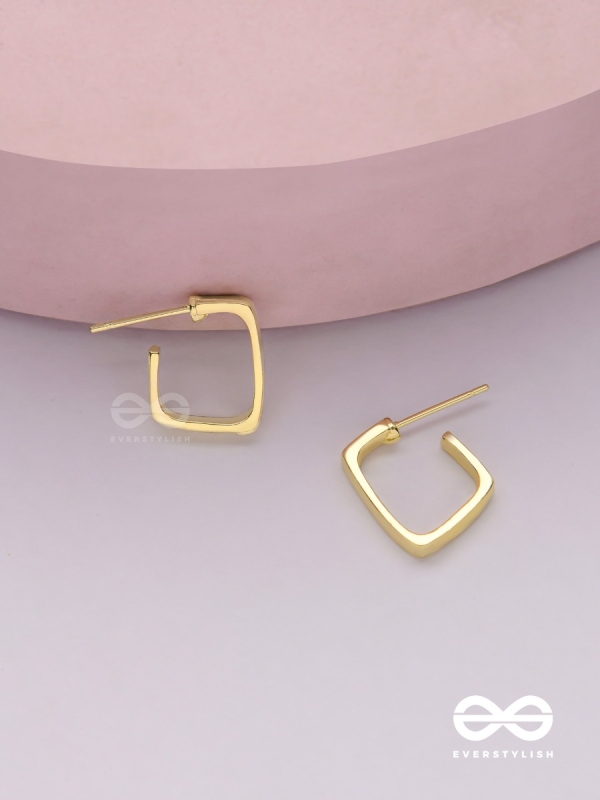 Golden glimmer- Golden colored rectangular  hoop earrings 