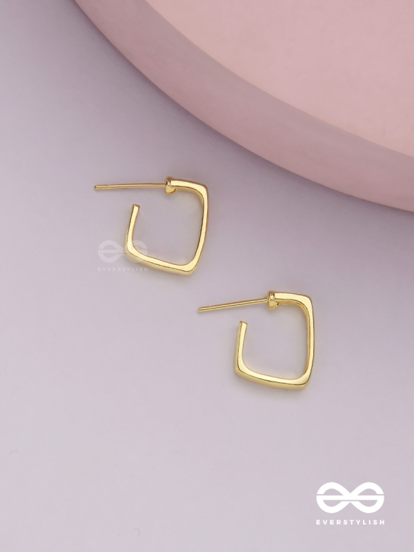 Golden glimmer- Golden colored rectangular  hoop earrings 