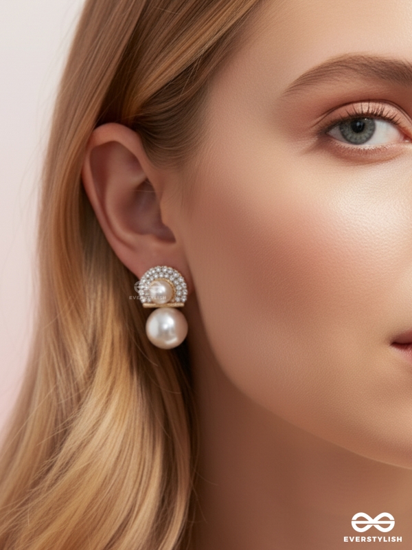 Crystal orbits-  crystal studded statement earrings with dropping pearls 