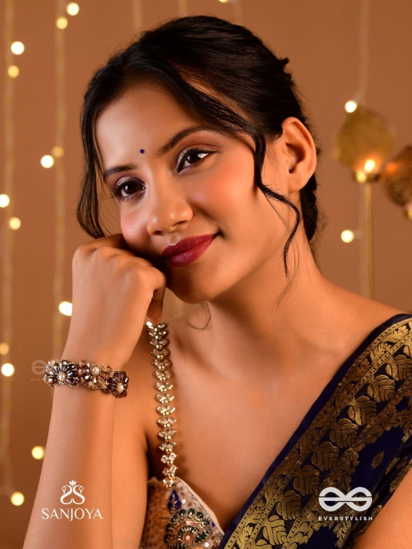 SHYAMALIKA – DARK BLOOM A FLORAL-INSPIRED BRACELET ADORNED WITH DARK-HUED GEMSTONES AND PEARLS