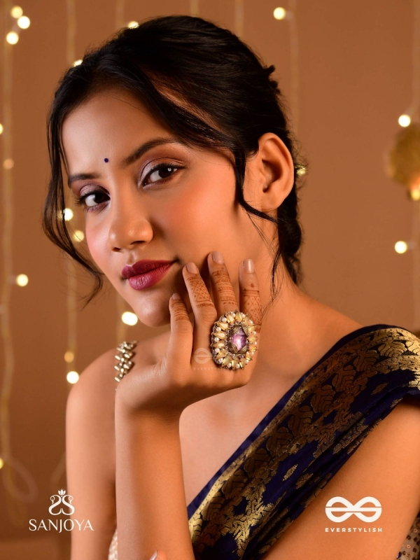 KANAKA PUSHPA – GOLDEN FLOWER EMBROIDERED FLOWER-SHAPED RING ADORNED WITH YELLOW GEMS AND PEARLS, GIVING A GOLDEN GLOW