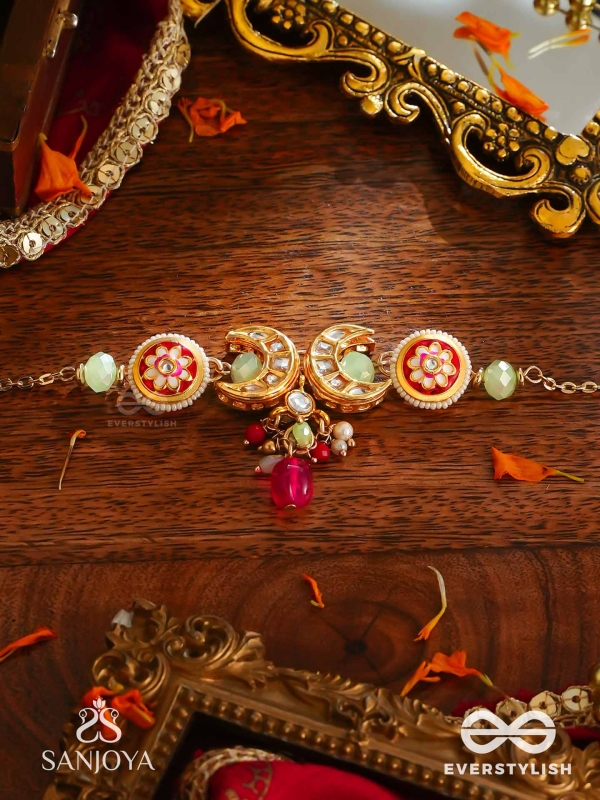 SHONAPRABHA- RADIANCE OF GOLD AND RED- HANDCRAFTED KUNDAN CHOKER  WITH GOLDEN MOONS AND RED BEADS