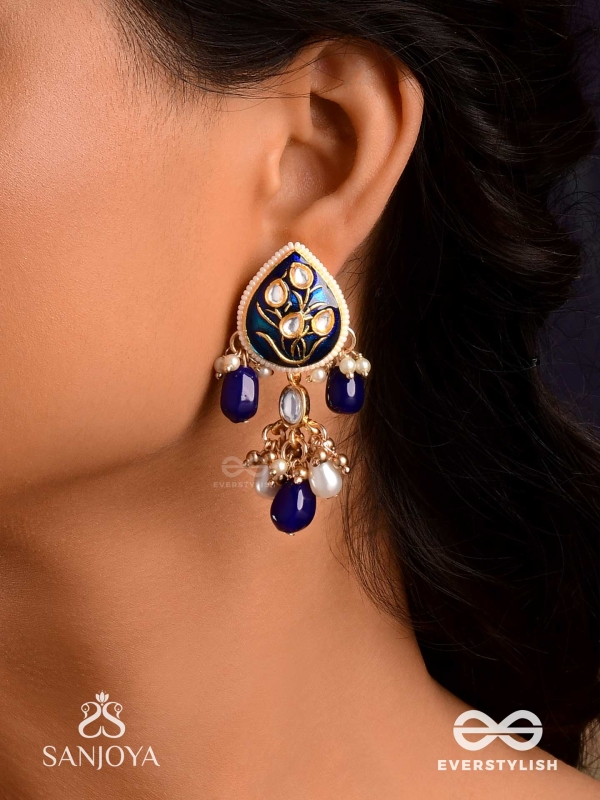 NILACHANDRIKA- MOONLIGHT OF THE BLUE SKY- KUNDAN EARRINGS WITH DEEP BLUE ENAMEL WORK WITH GOLDEN DETAILS, PEARLS, AND DAZZLING GEMS
