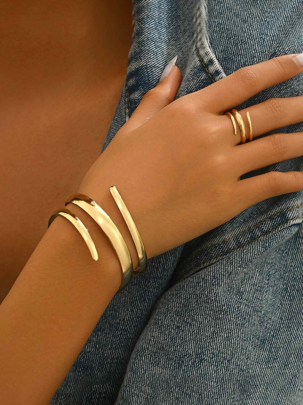 AURIC SWIRL - CONTEMPORARY GOLDEN TWIST RING+ TWISTED GLEAM- SLEEK AND POLISHED METALLIC CUFF BRACELET
