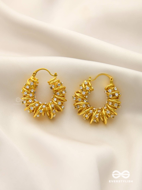 LUSTROUS SWIRLS-  INTRICATE TWISTED GOLD EARRINGS WITH SHIMMERING STONE