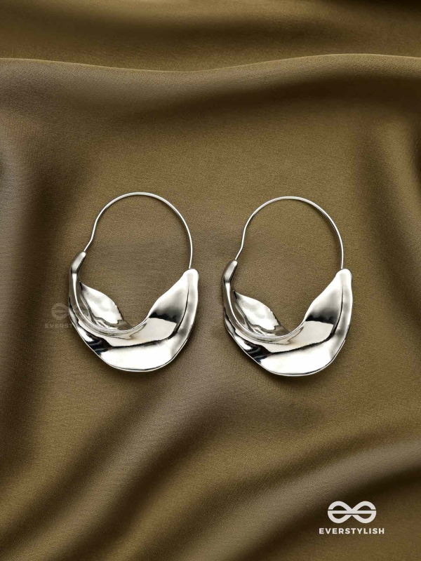 SILVER DRIFT- SCULPTED SILVER HOOPS WITH A FLUID