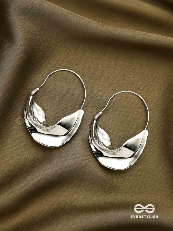 SILVER DRIFT- SCULPTED SILVER HOOPS WITH A FLUID