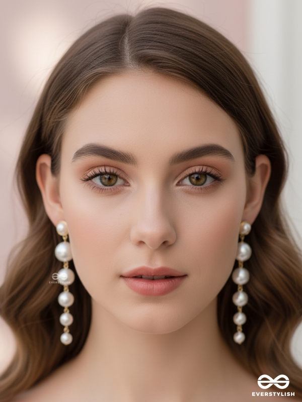 Elegance is a deadly weapon- white pearls statement earrings