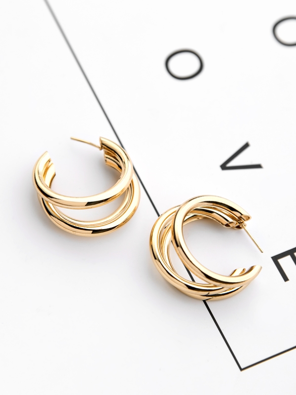 The Elegant Statement Makers - Golden Stud Earrings