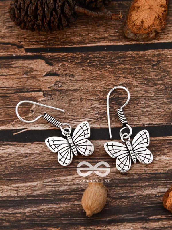 The Cutesy Butterfly Danglers - Tiny Trinket Earrings