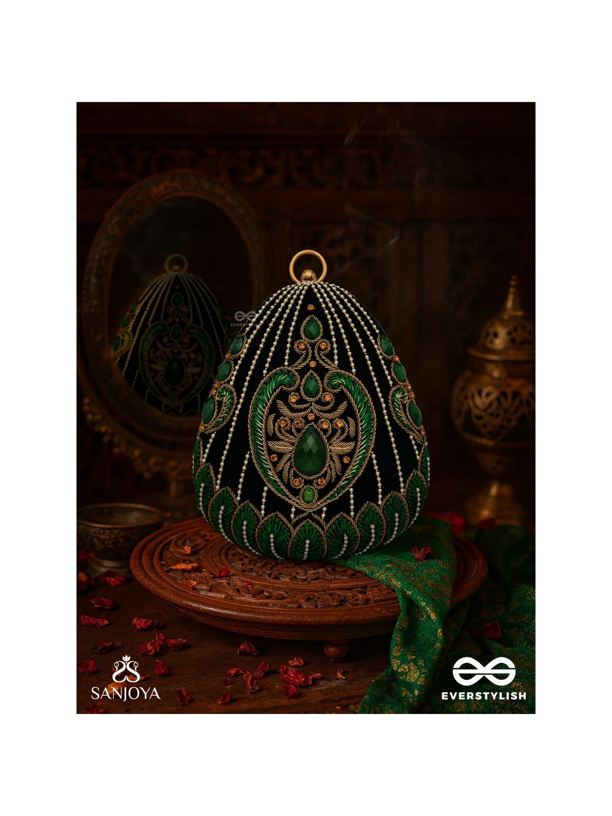 MEHREENA – OVAL DARK GREEN VELVET CLUTCH WITH INTRICATE HANDWORK AND GOLDEN METAL FRAME