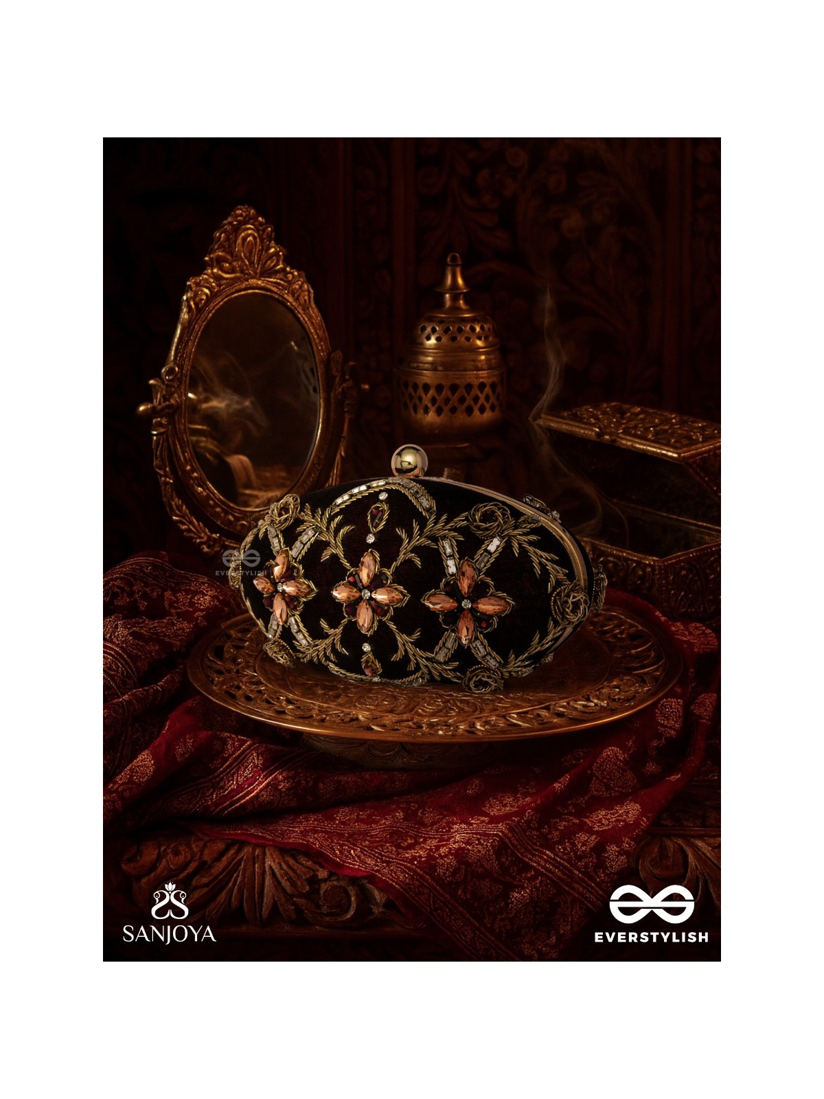 ROHINI – POLISHED BRONZE BROWN TEXTILE CLUTCH WITH FACETED JEWEL ACCENTS AND GOLDEN METAL FRAME