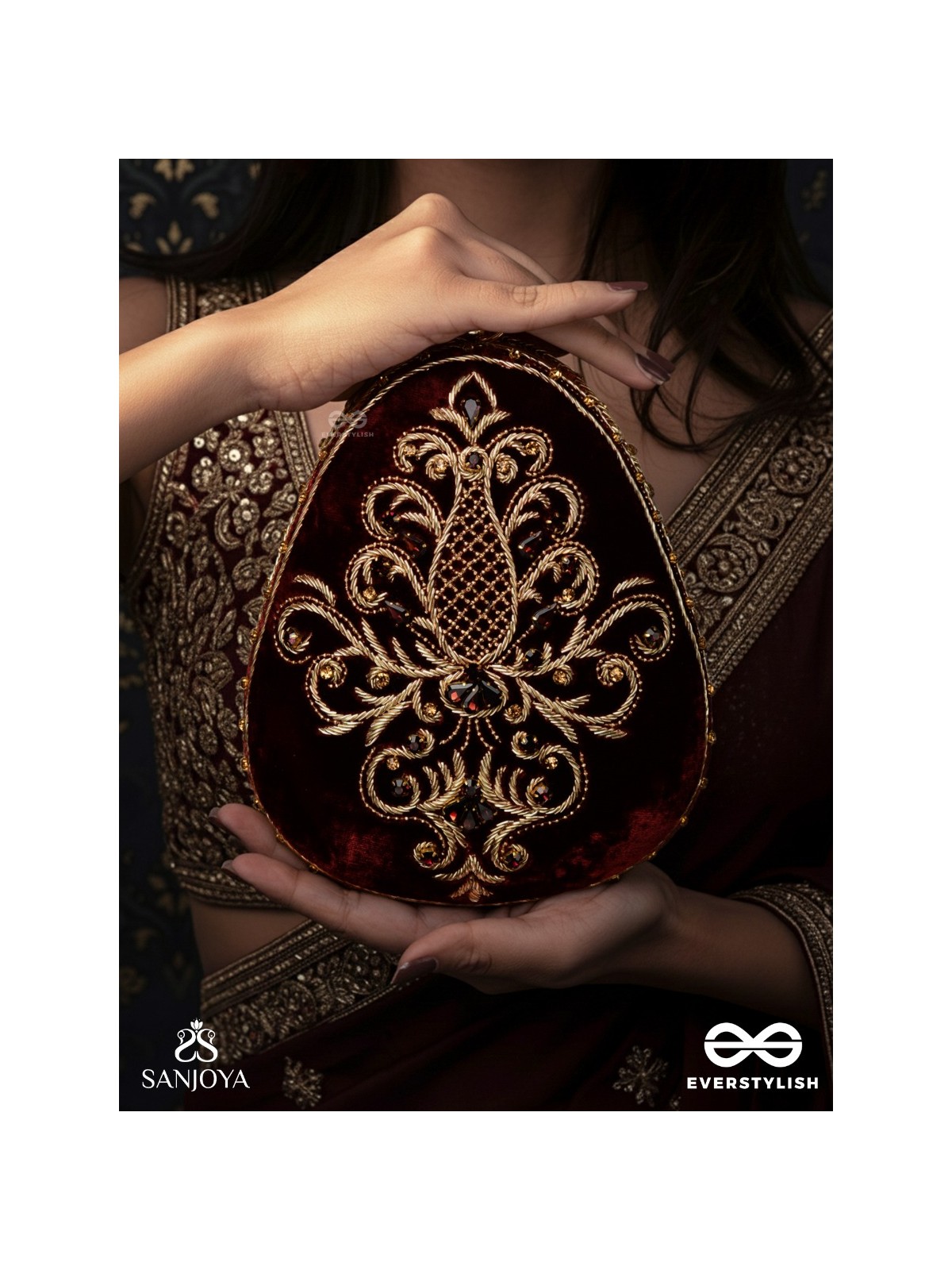 NOOR – OVAL MAROON VELVET CLUTCH WITH RICH ZARDOZI EMBROIDERY AND GOLDEN METAL FRAME