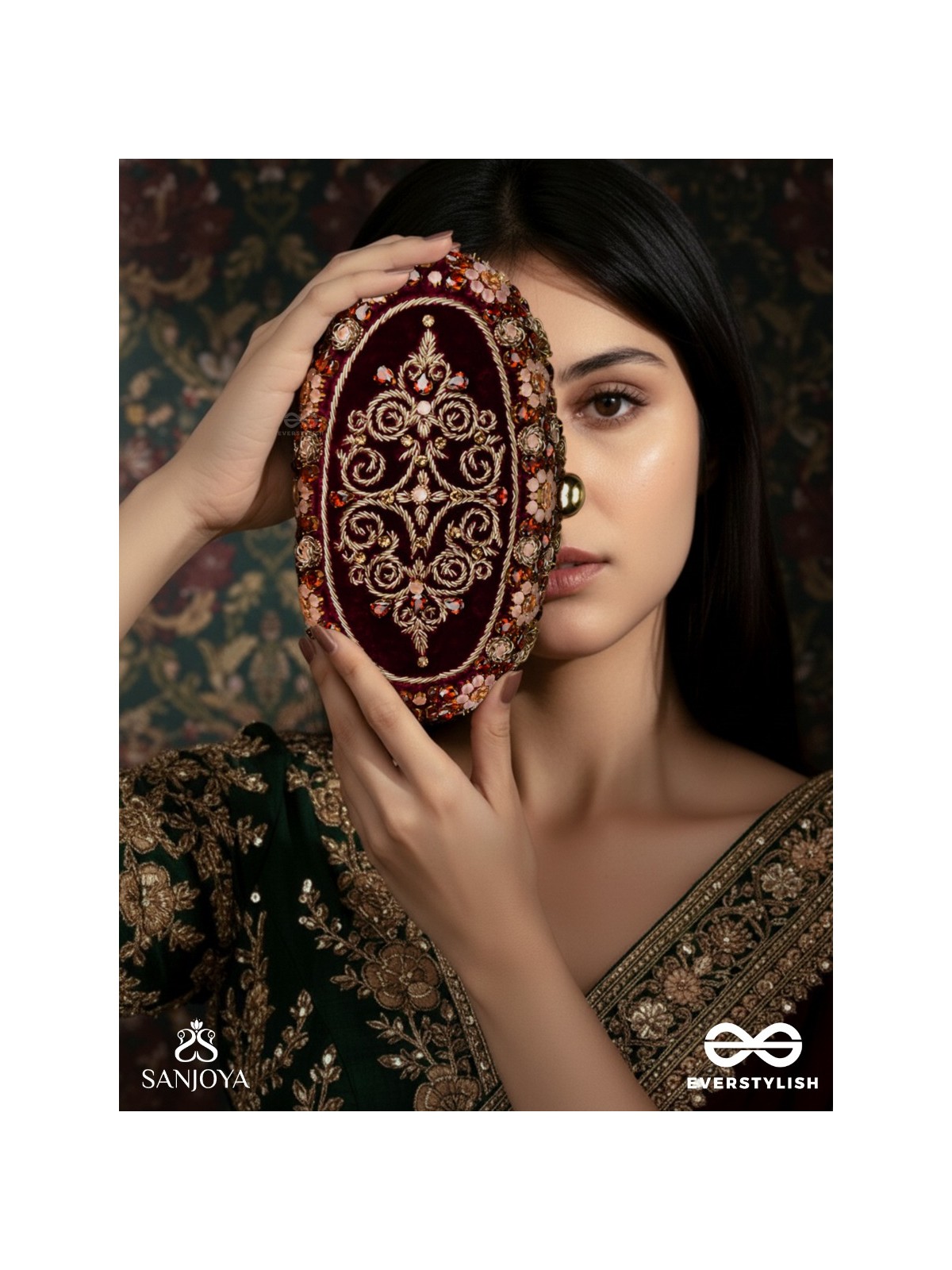 ZEVARIYA – HEIRLOOM-STYLE OVAL CLUTCH WITH INTRICATE ZARI DETAILING AND GOLDEN METAL FRAME