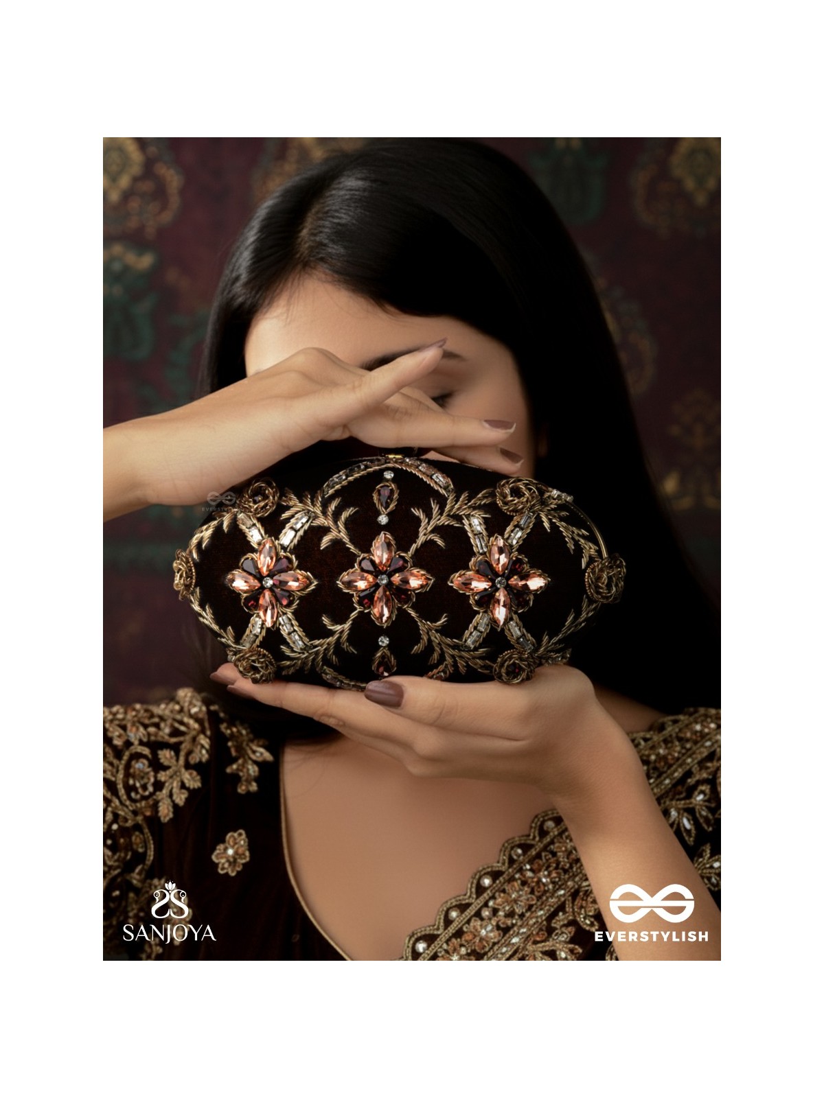 ROHINI – POLISHED BRONZE BROWN TEXTILE CLUTCH WITH FACETED JEWEL ACCENTS AND GOLDEN METAL FRAME