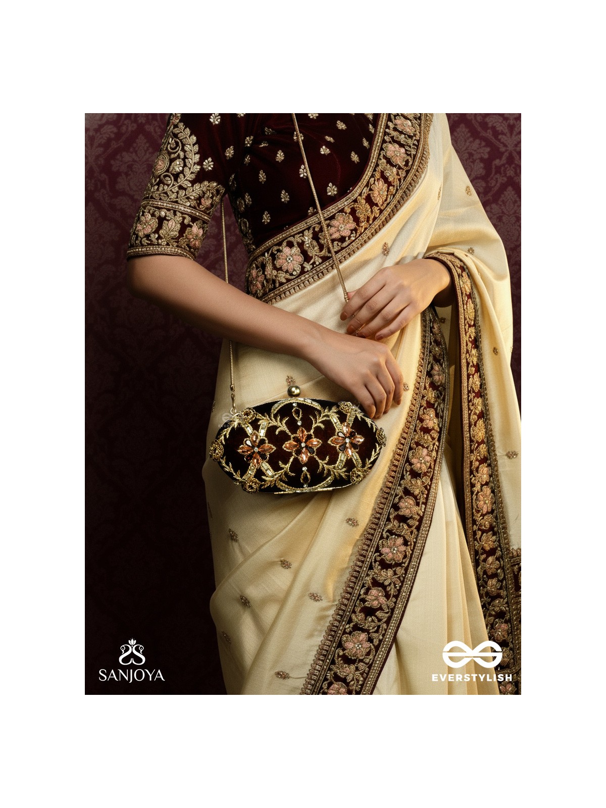 ROHINI – POLISHED BRONZE BROWN TEXTILE CLUTCH WITH FACETED JEWEL ACCENTS AND GOLDEN METAL FRAME