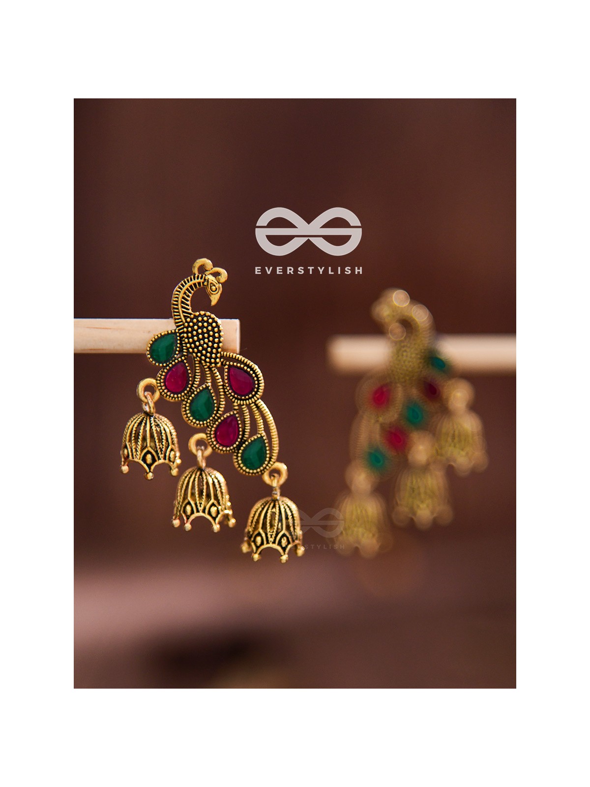 The magnificent meryll Intricate Peacock jhumkis (Golden)