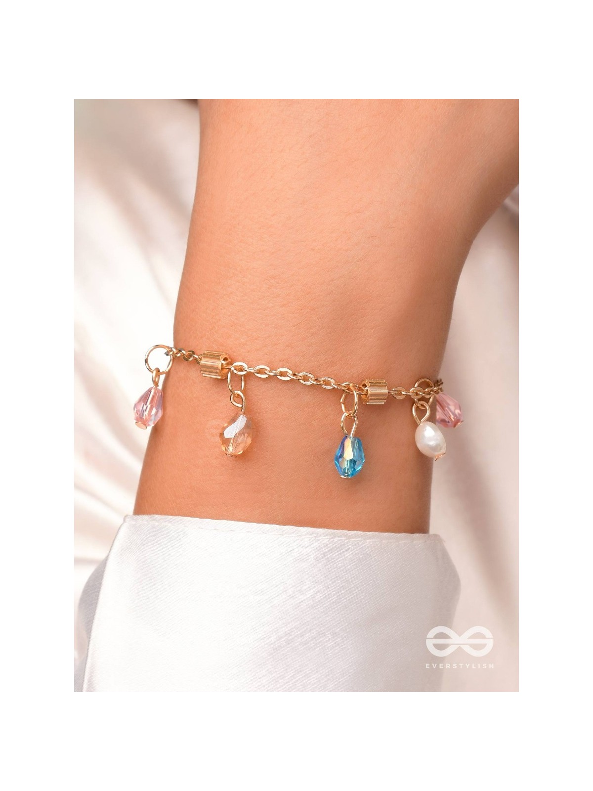 The Shimmering Sleet- Pearl and Crystals Studded Golden Bracelet
