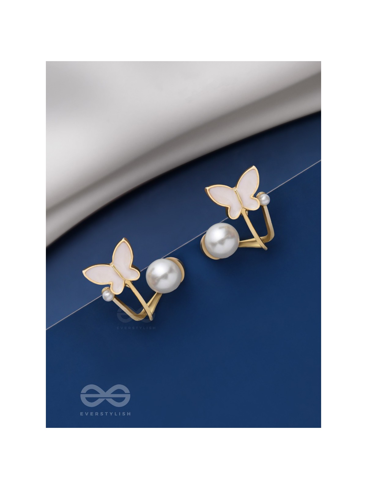 A WINGED WONDER - GOLDEN AND WHITE EAR JACKETS
