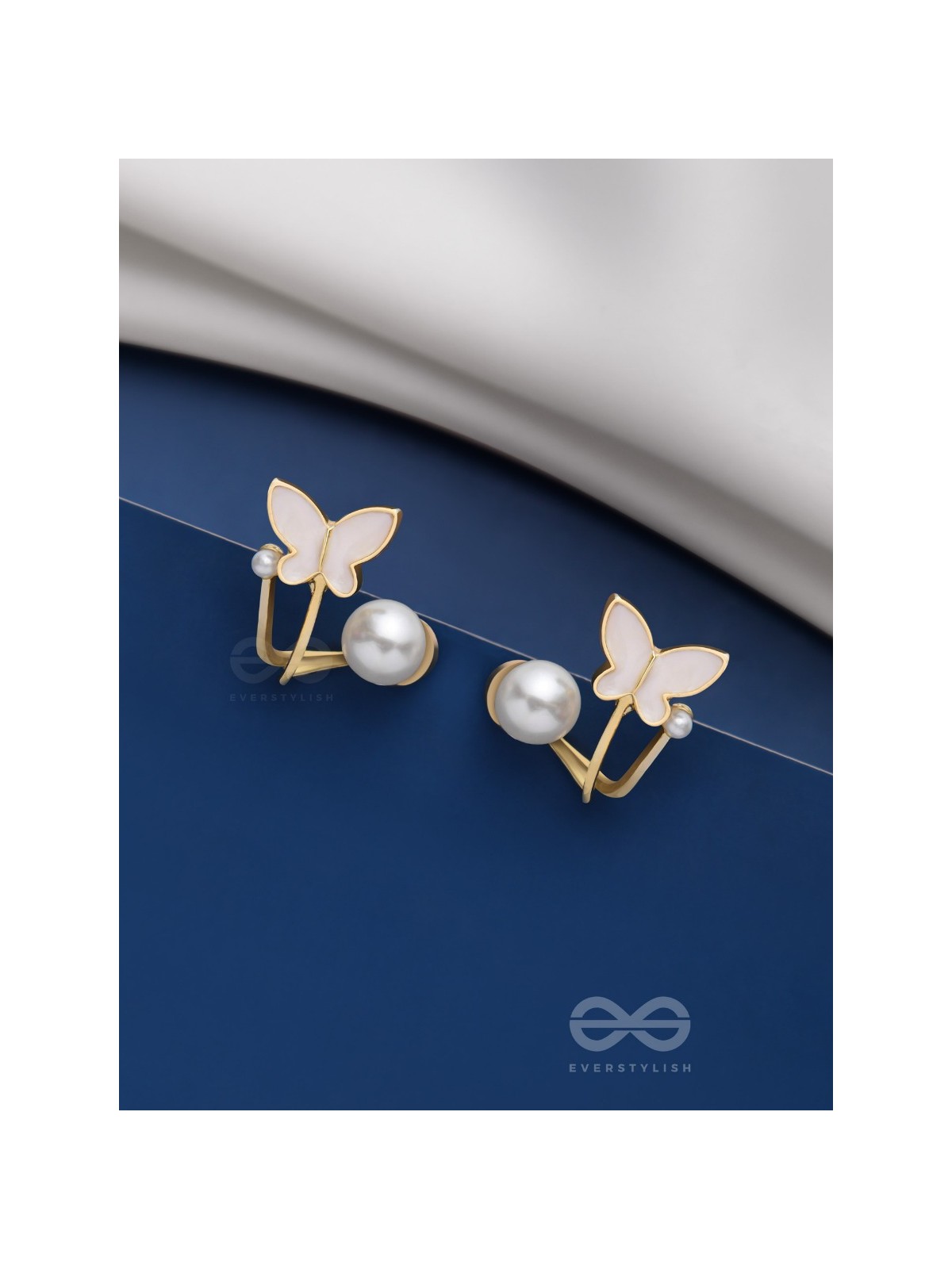 A WINGED WONDER - GOLDEN AND WHITE EAR JACKETS