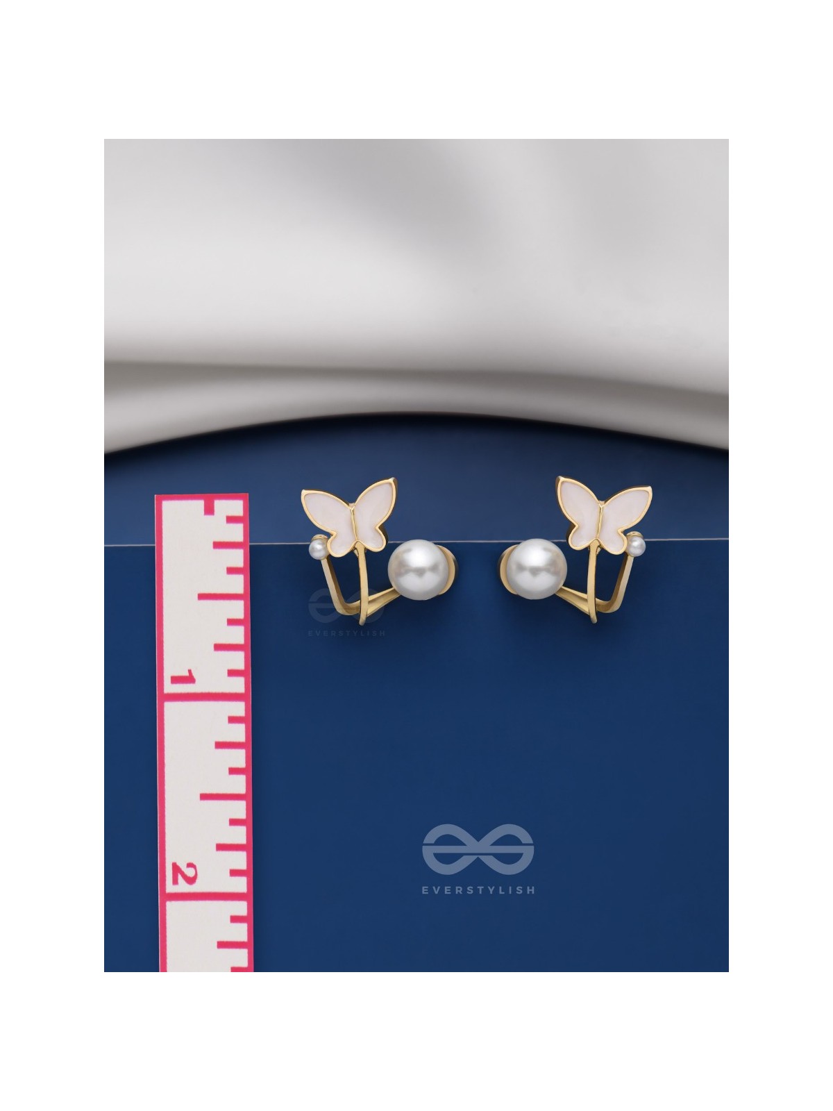 A WINGED WONDER - GOLDEN AND WHITE EAR JACKETS