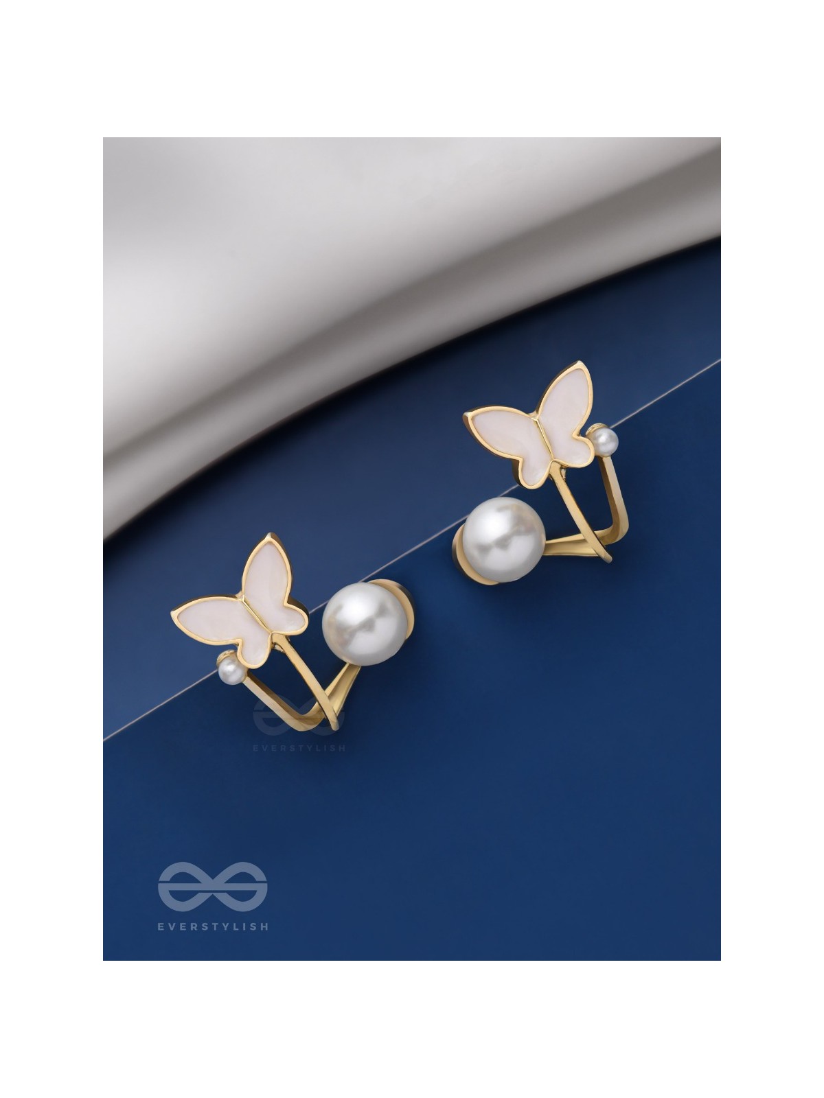 A WINGED WONDER - GOLDEN AND WHITE EAR JACKETS
