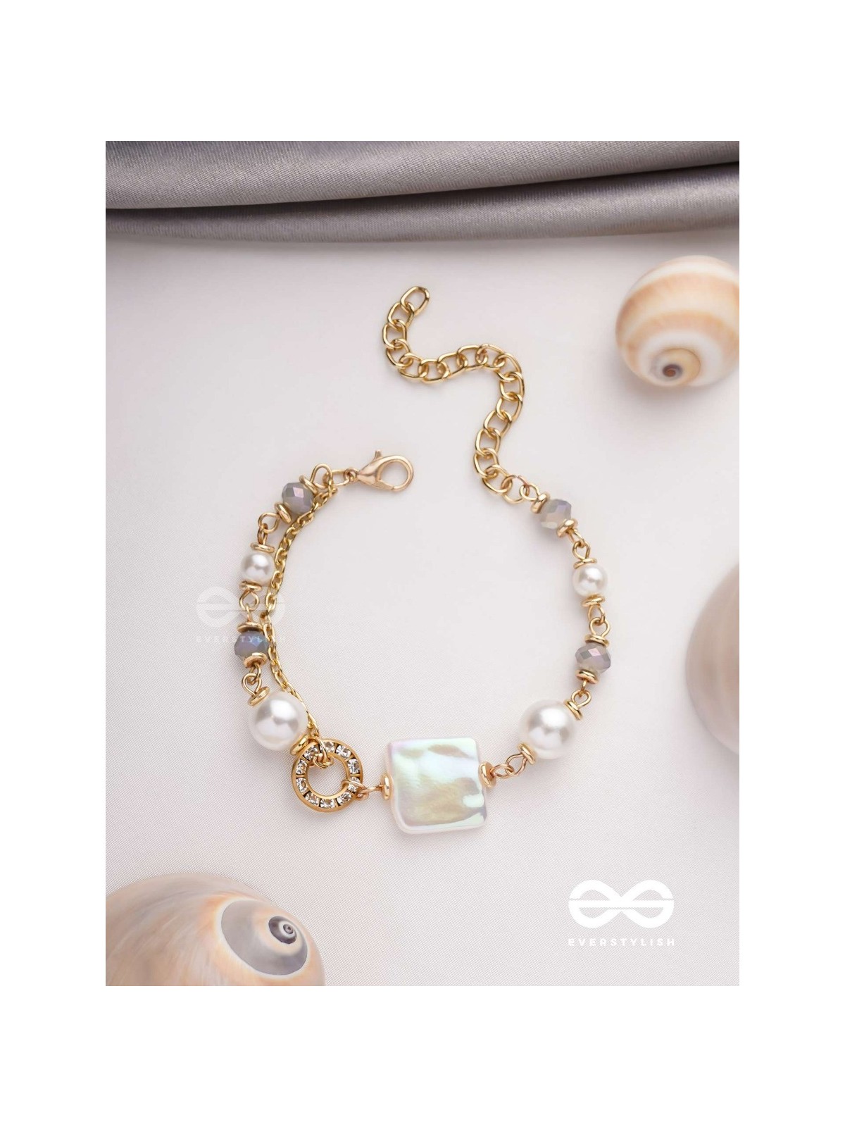 CLASSIC IVORY ALLURE - GOLDEN EMBELLISHED BRACELET WITH ANTI TARNISH COATING 