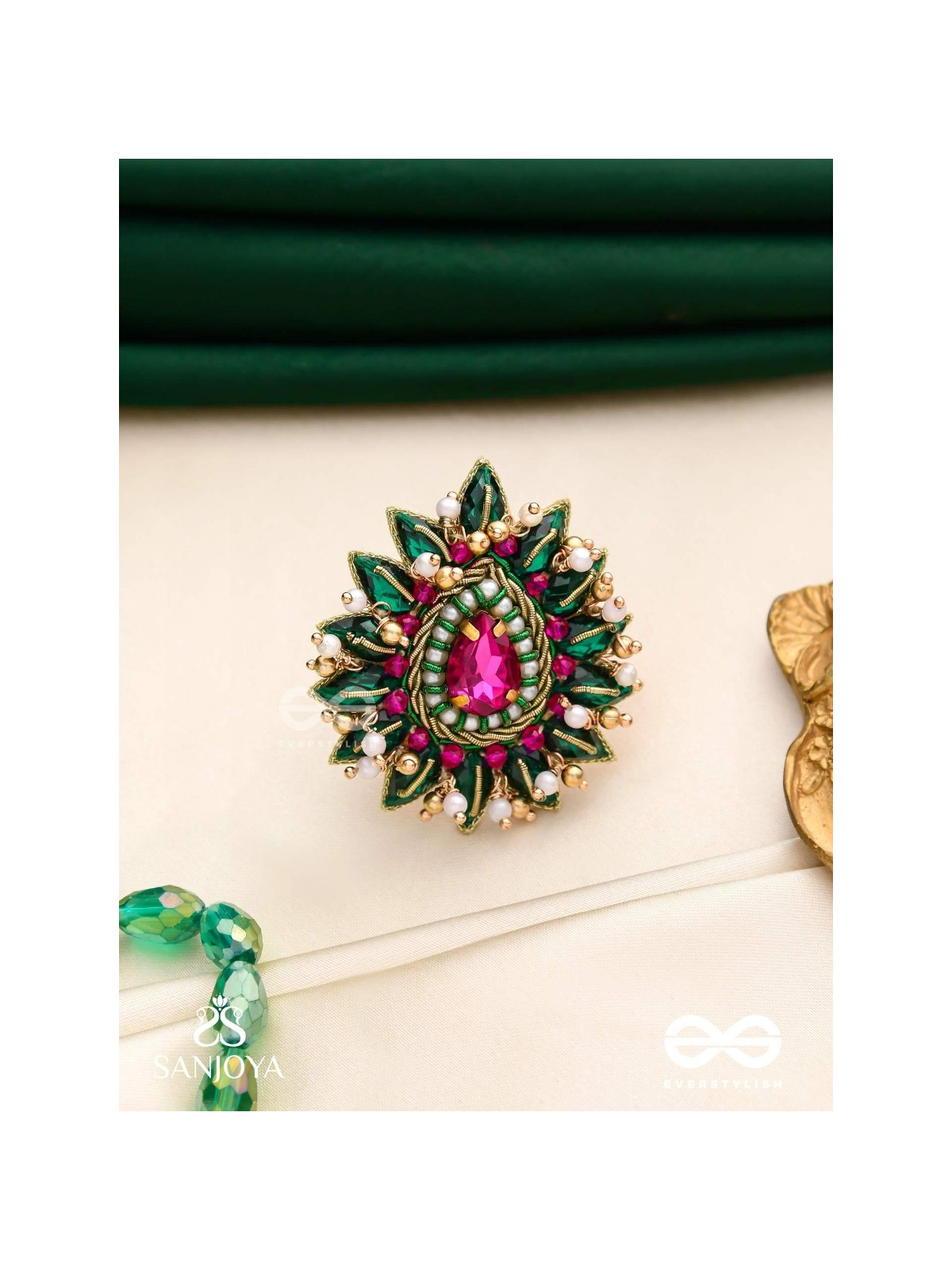 KANTARA - THE CHARM HOLDER - EMBROIDERED FLOWER DESIGN WITH PURPLE GEMSTONE AND PEARLS